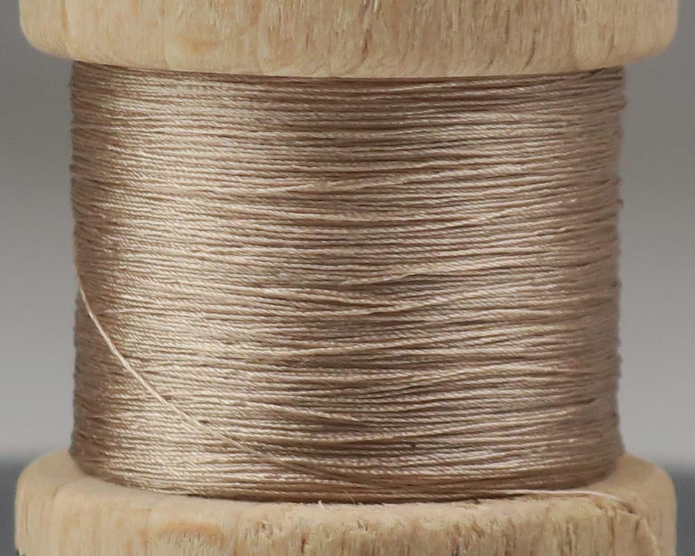 Taupe metallic sheen pure silk thread tightly wound on small wooden spool for fly tying (Ephemera silk thread)