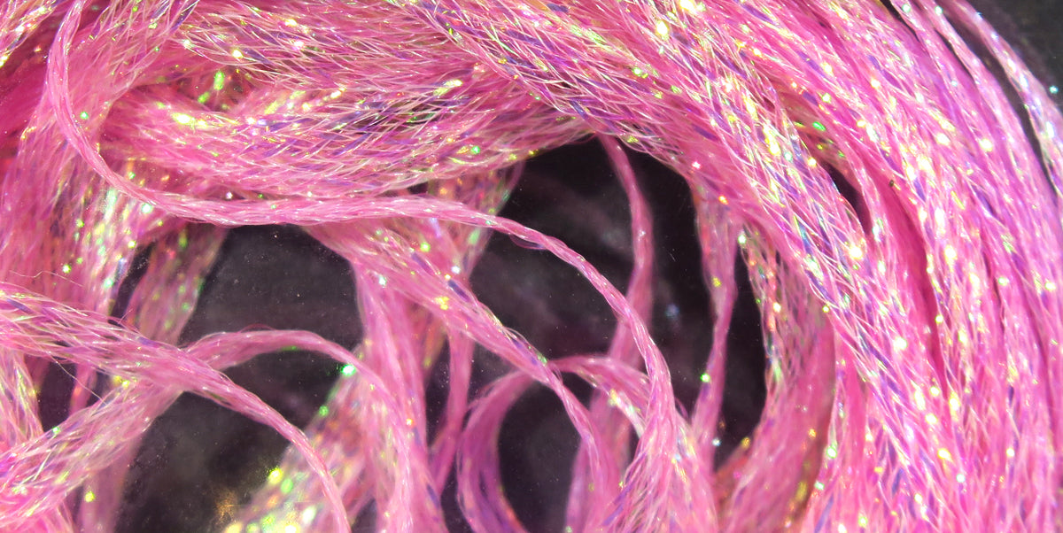 Pink iridescent mini flat fly braid strands, shiny synthetic fibers twisted into thin flat braid for fly tying