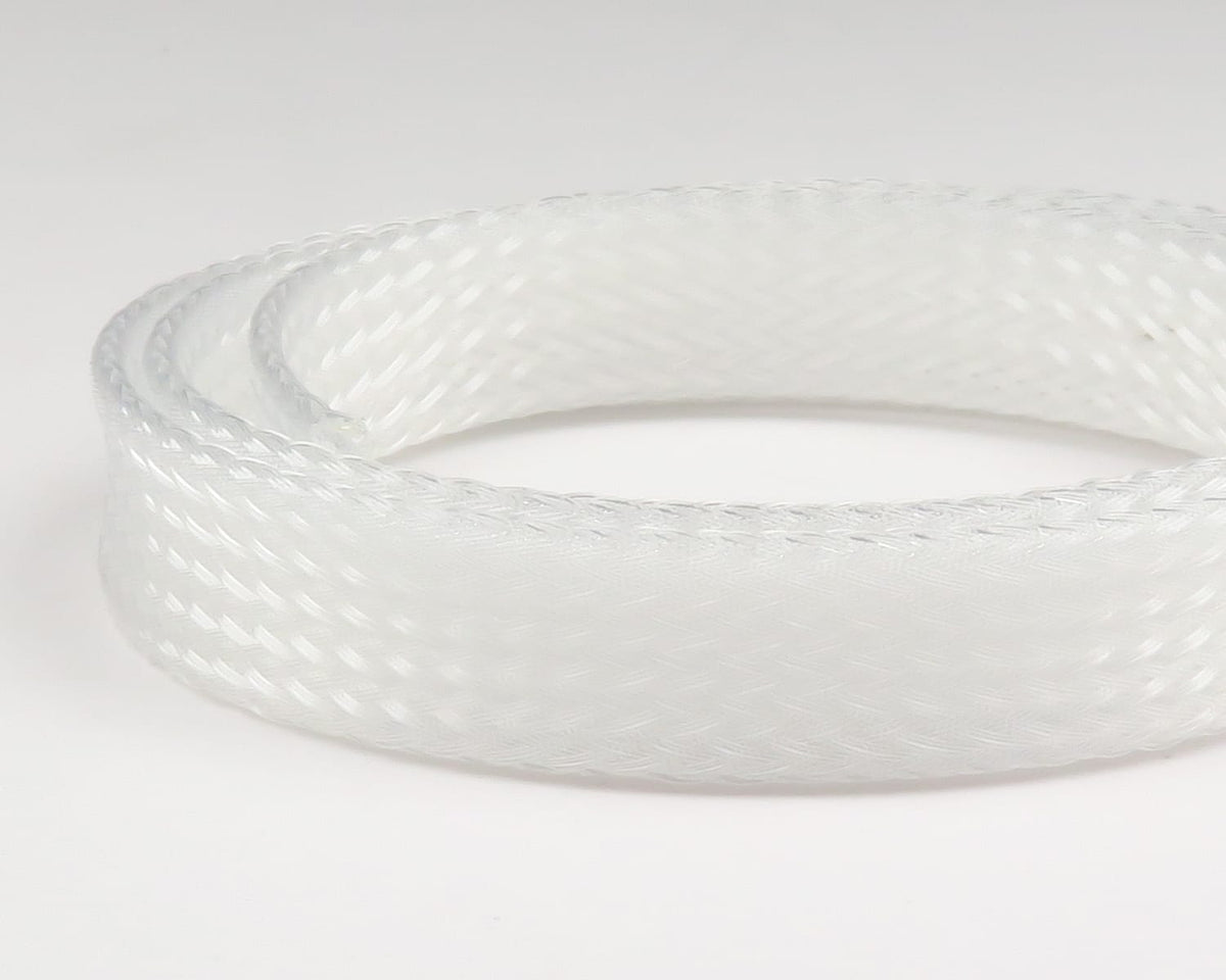 White translucent braided nylon body tubing coil with woven texture for fly tying
