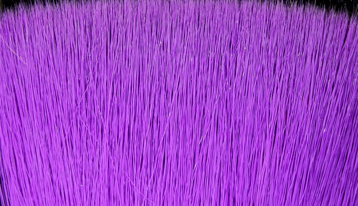 Vibrant purple Fish-Skull faux bucktail fibers, dense synthetic hair with fine strands and subtle flash for fly tying