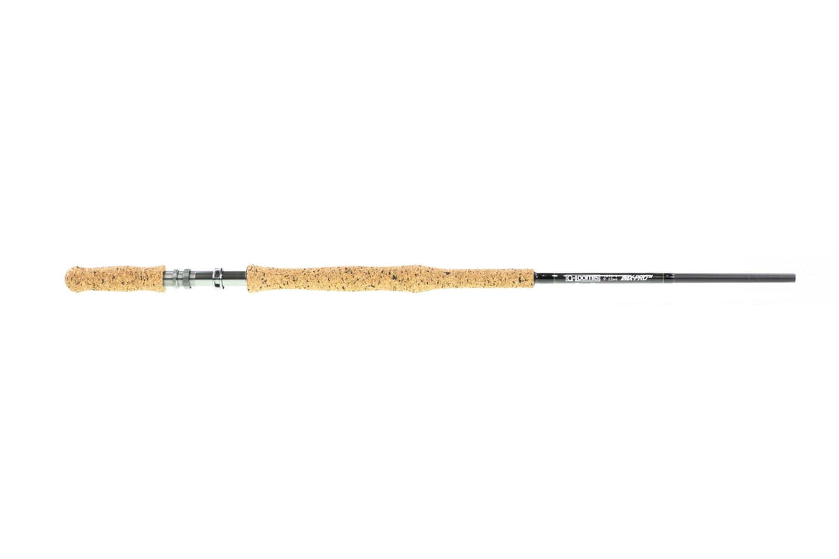 G. Loomis IMX-Pro musky fly rod with black graphite blank, long speckled cork grip and metal reel seat