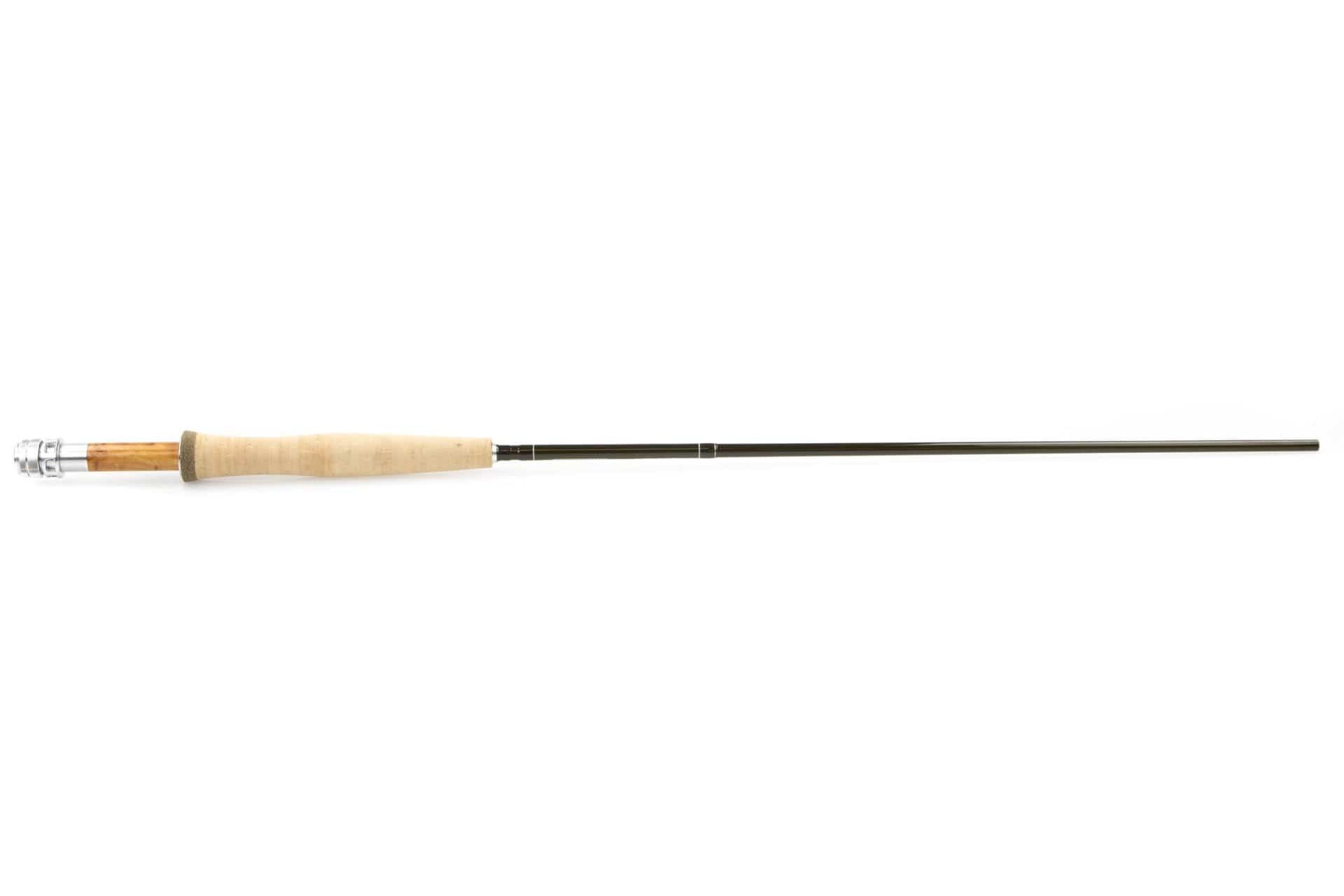 G. Loomis NRX+ LP fly rod with dark graphite blank, natural cork grip and wooden reel seat with silver hardware