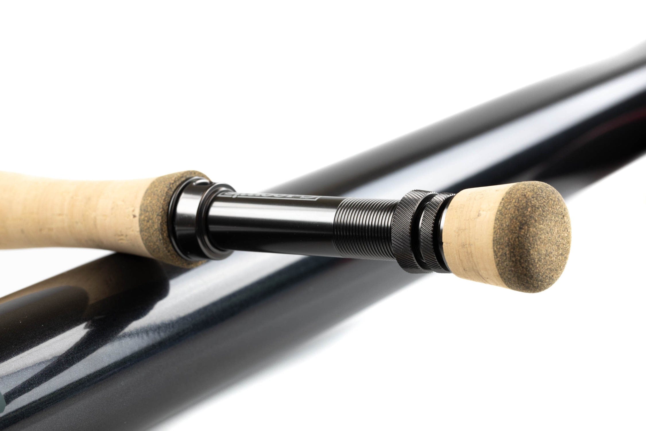 G. Loomis NRX+ Swim Fly rod with cork grips, knurled black reel seat and glossy graphite blank
