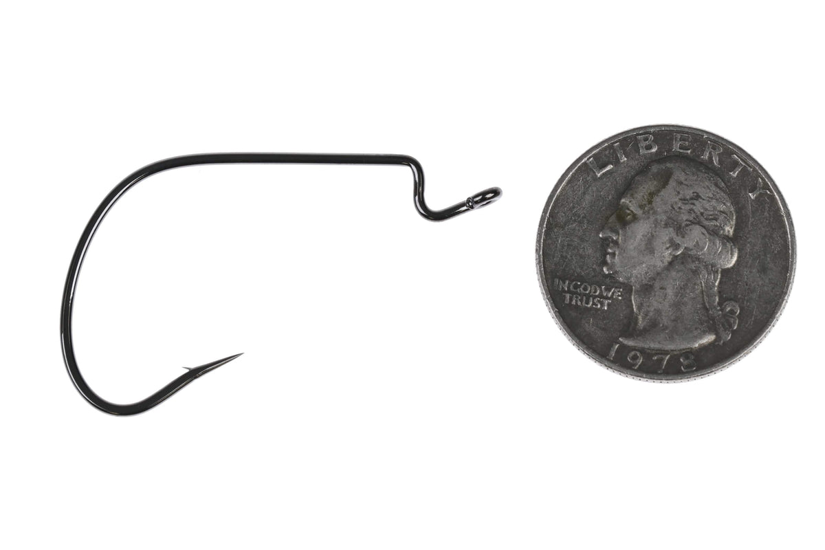 Gamakatsu black nickel G-Lock wide-gap worm hook with offset eye and sharp barb beside quarter for scale fly tying hook
