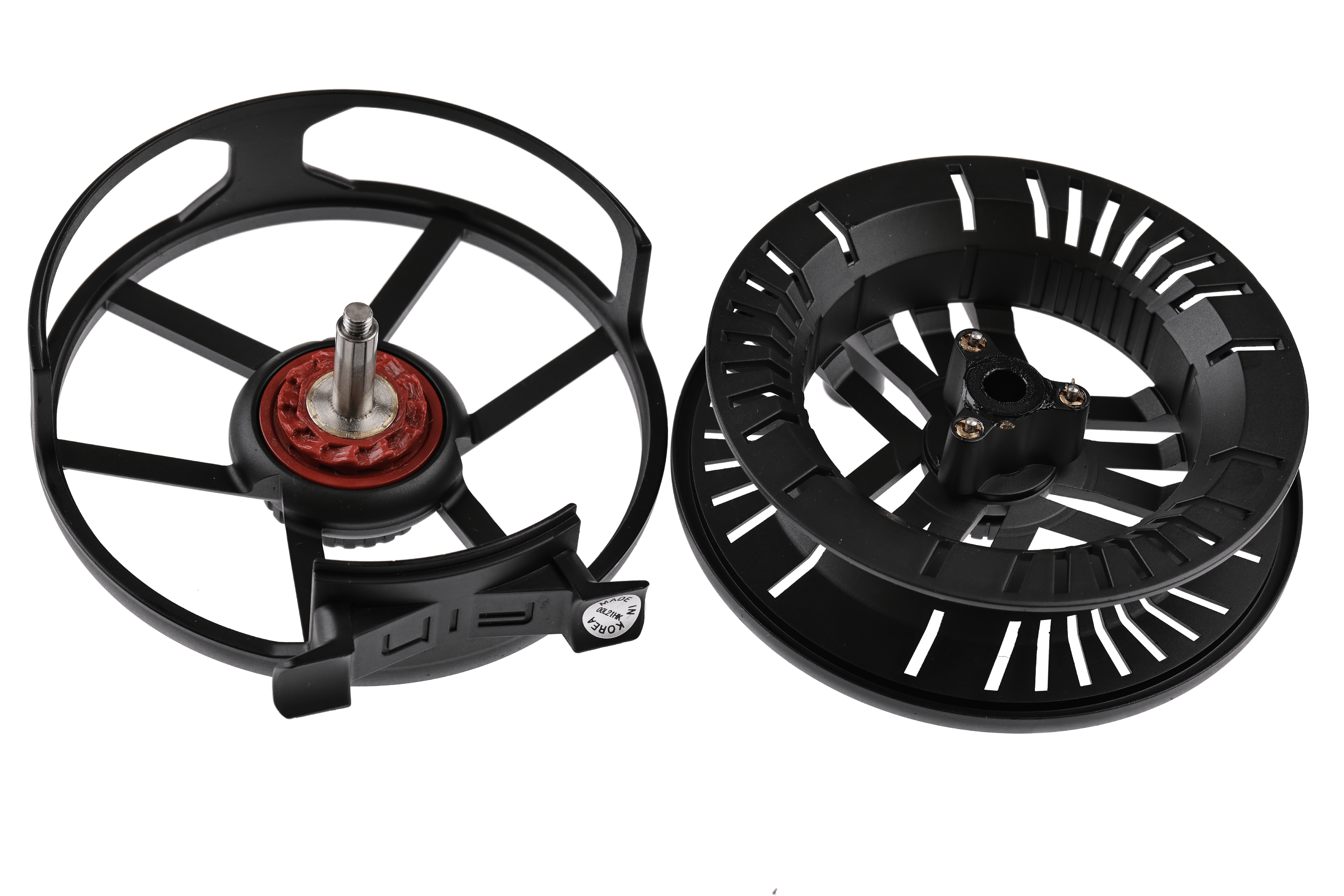 Black Greys Fin fly reel with ventilated anodized metal spool, split frame showing red bearing and stainless spindle