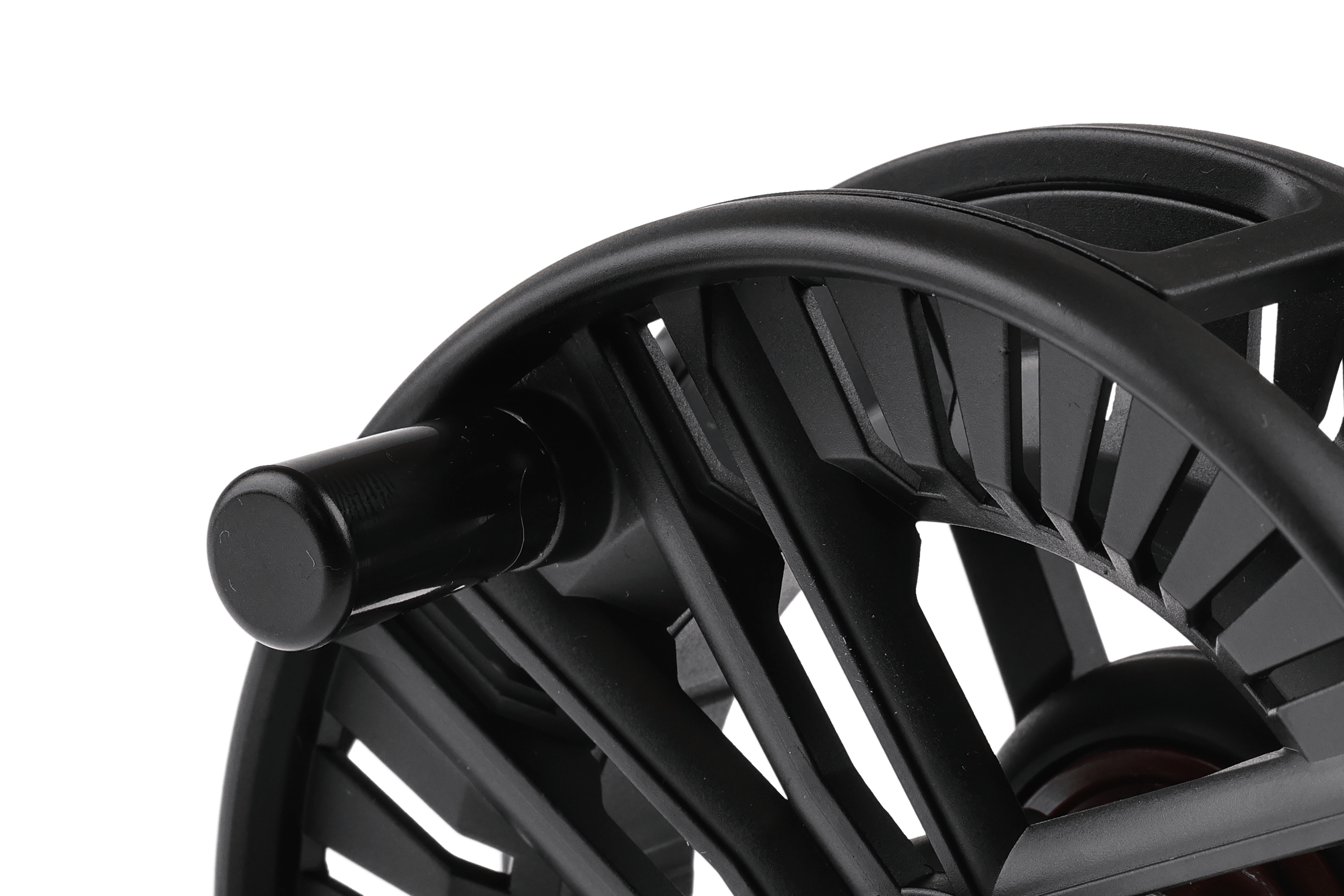 Close-up matte black Greys Fin fly reel spool with open skeleton metal frame, anodized finish and cylindrical handle knob
