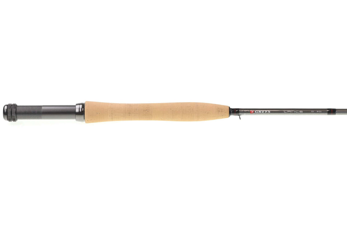 Greys Lance fly rod cork handle with black anodized reel seat and dark graphite blank, trimmed with red accents