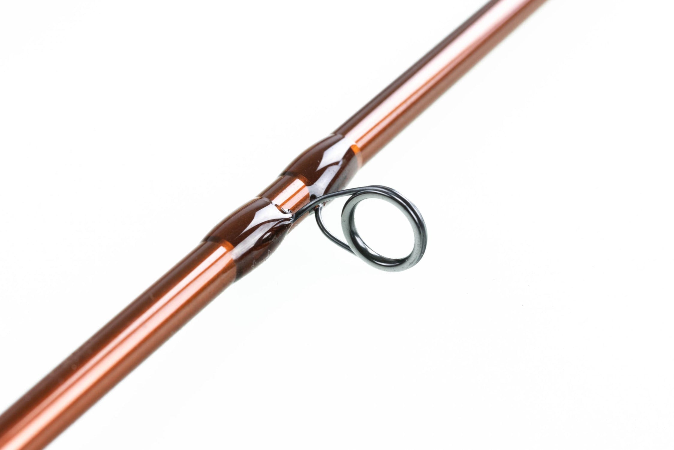 Hardy Ultralite X copper-brown fly rod close-up showing glossy blank and black guide ring