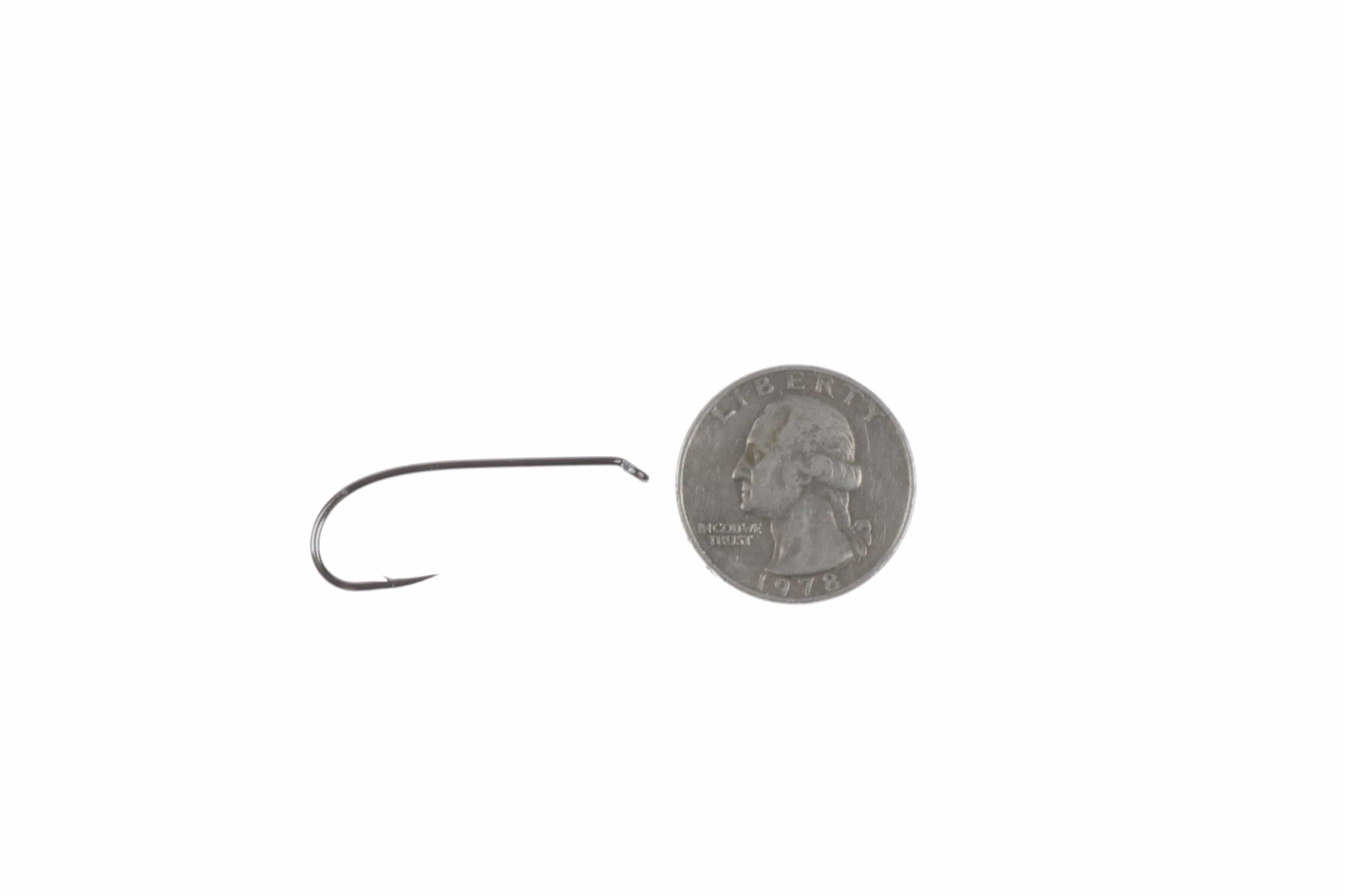 Gunmetal Ahrex nymph hook with round bend and small barb beside US quarter for scale, metal fly tying hook