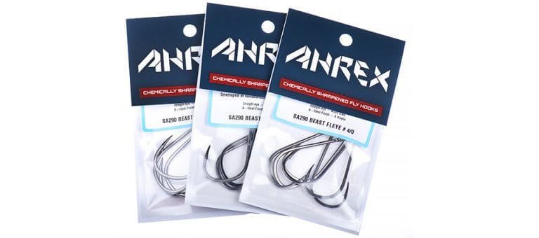 Three clear packs of Ahrex SA290 Beast Fleye black-nickel fly hooks with navy header cards, sharpened