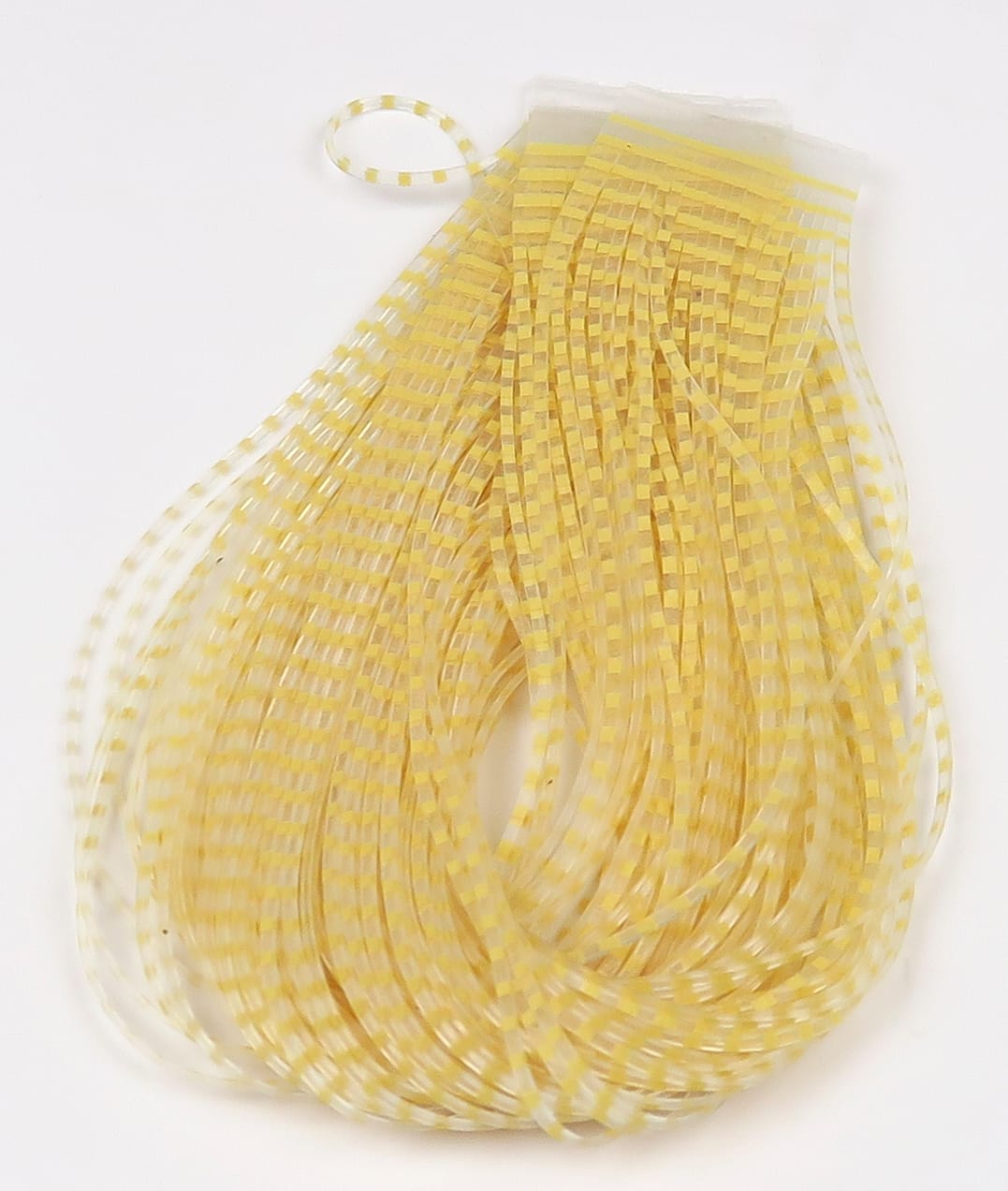 Bundle of yellow and white barred translucent synthetic fly-tying legs with fine segmented stripes and glossy plastic texture