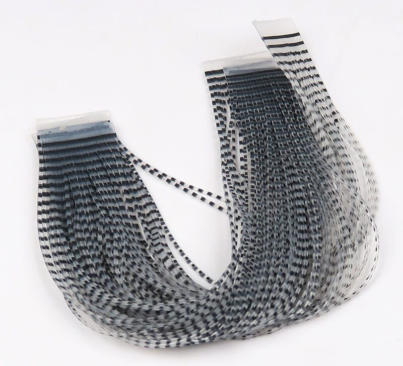 Black-and-white barred crusher legs for fly tying, long thin flexible strips with checkered pattern
