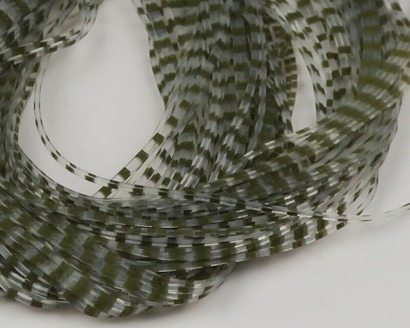 Olive green and white barred crusher legs, thin striped feather strands for fly tying
