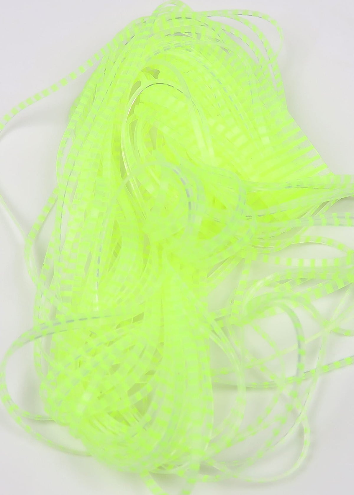 Neon chartreuse translucent synthetic barred crusher legs - thin checkered rubber strips for fly tying