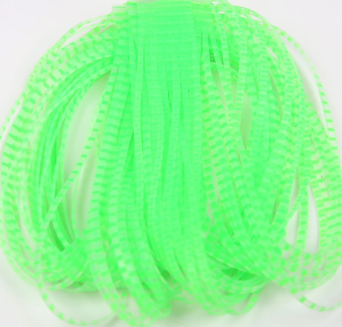 Chartreuse barred rubber crusher legs, long translucent silicone strips with narrow white bands for fly tying