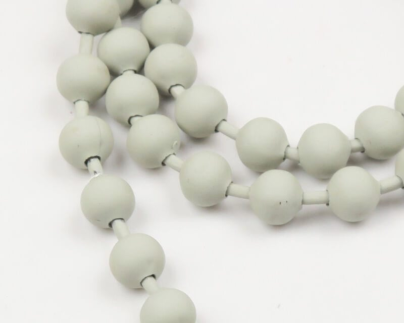 Matte light gray plastic bead chain with linked round beads, Chicone's stealth design for fly tying