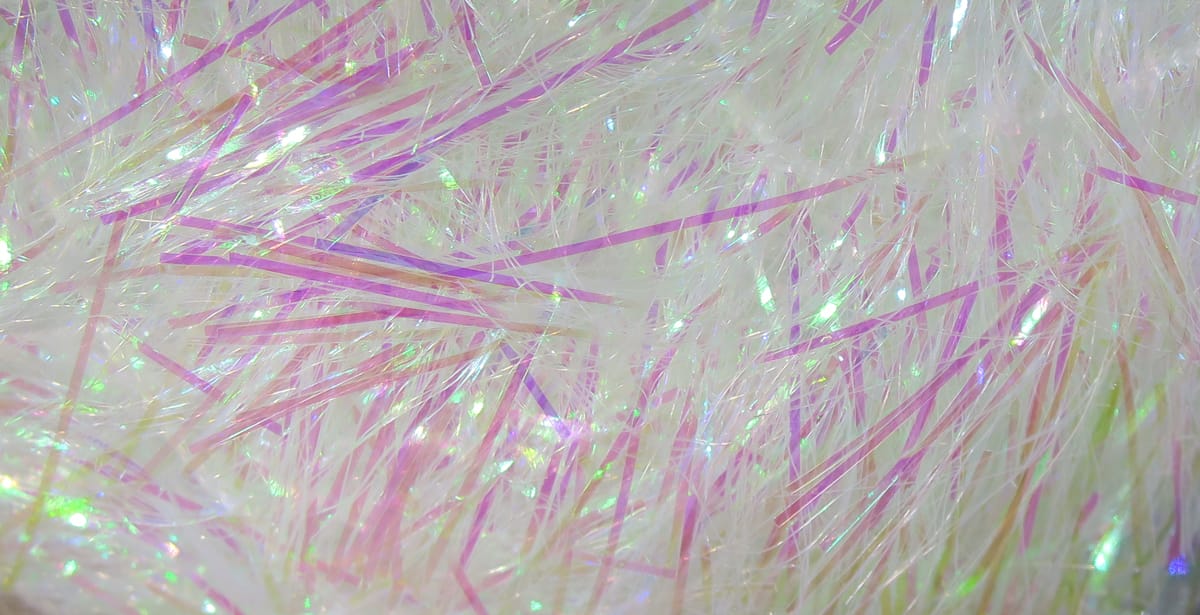 Iridescent white and pink synthetic filler flash strands with thin tinsel fibers for fly tying