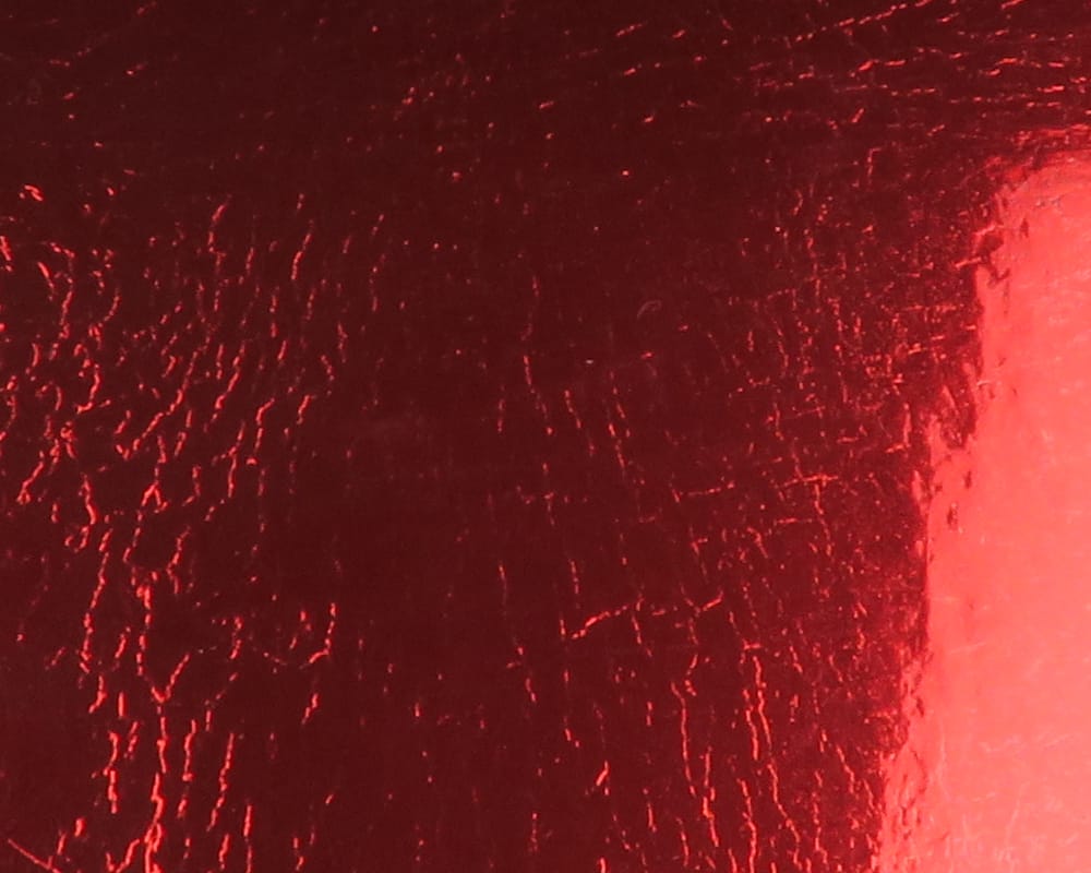 Red metallic Chocklett's Loco Foam sheet with glossy crackle texture for fly tying