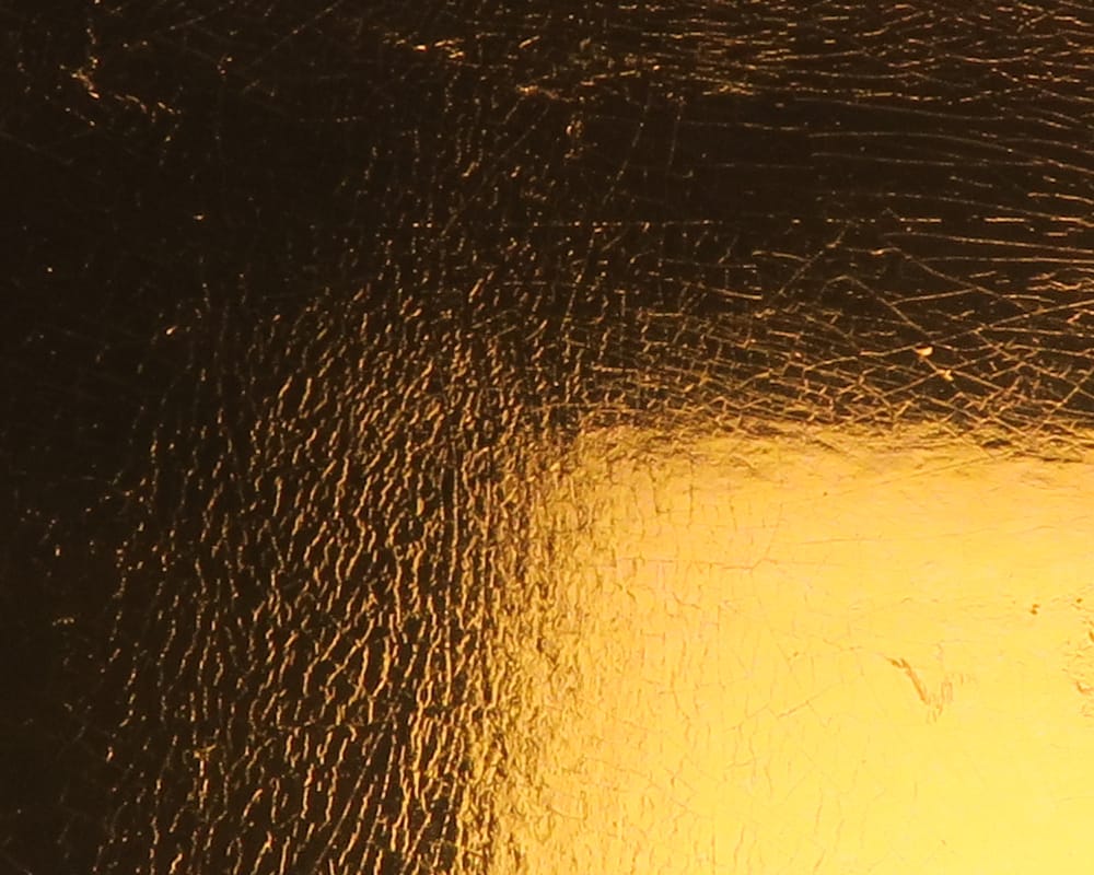 Metallic gold textured Chocklett's Loco Foam sheet with cracked reflective surface for fly tying