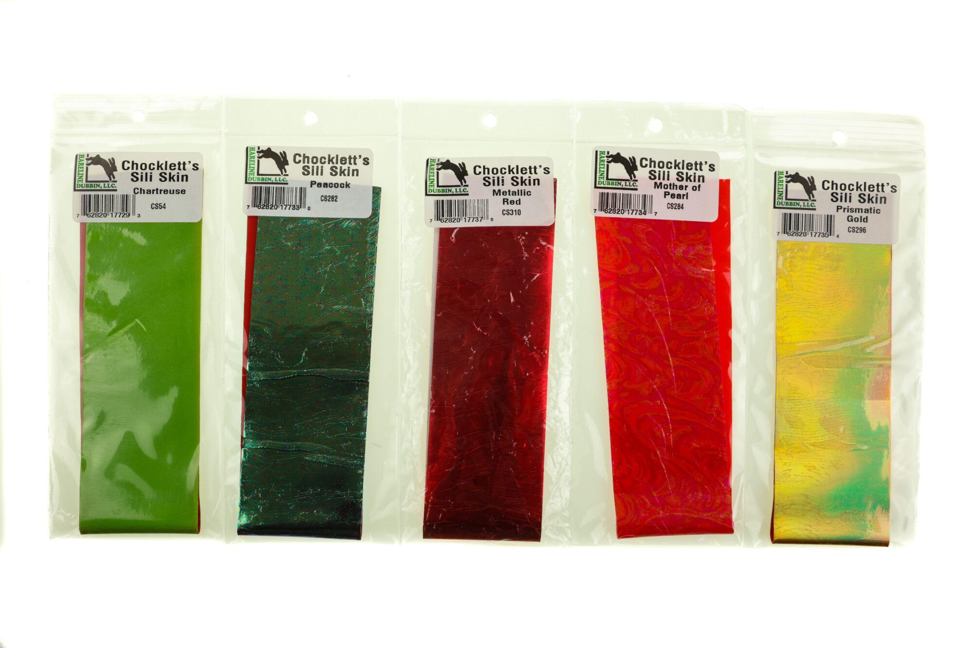 Five Chocklett's Sili Skin fly tying silicone strips in chartreuse, peacock, metallic red, mother-of-pearl and prismatic gold