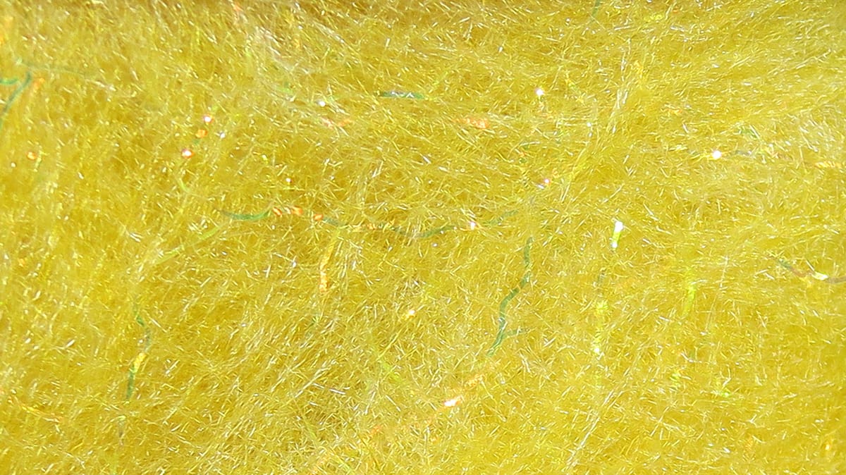 Bright yellow Hareline Jr. Bruiser Blend synthetic dubbing with iridescent strands for fly tying