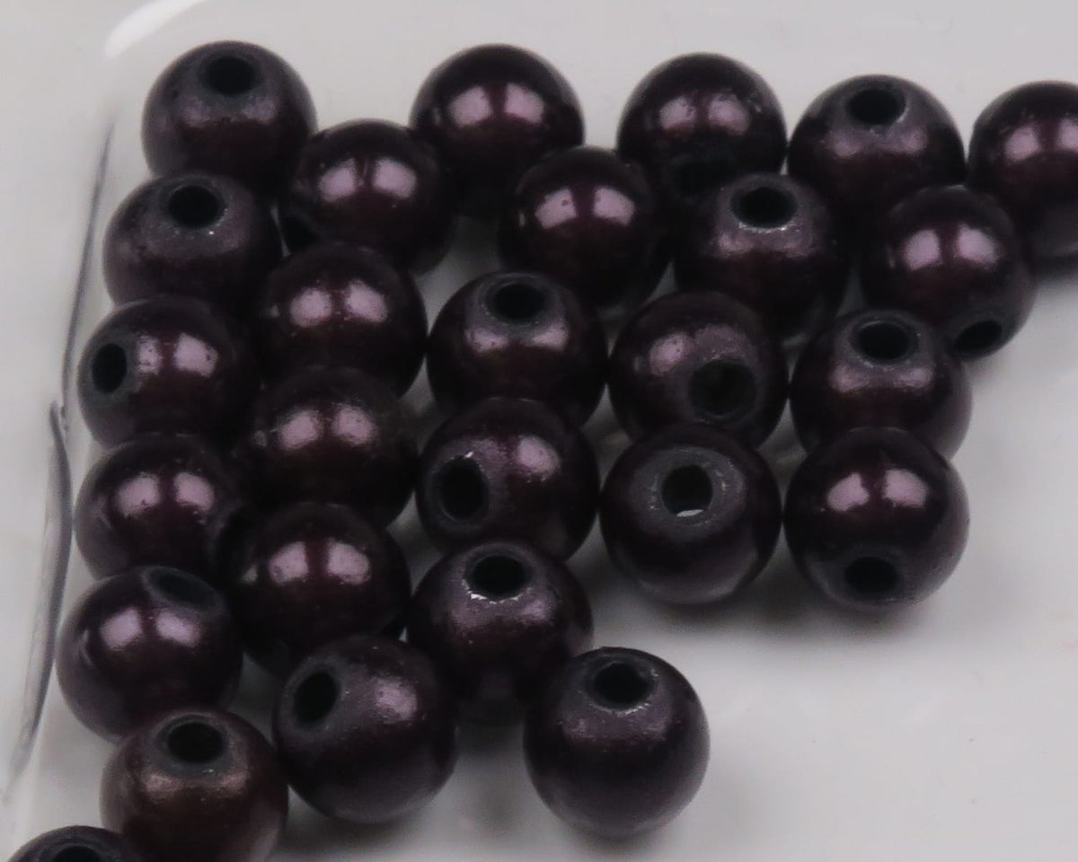 Glossy Hareline 3D beads, deep metallic plum round beads with central holes, ideal for fly tying