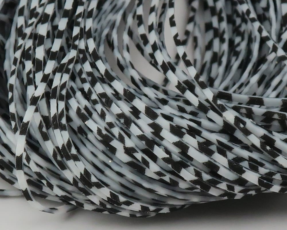 Black and white barred rubber Crazy Legs strips for fly tying, thin flexible legs with zebra-style pattern