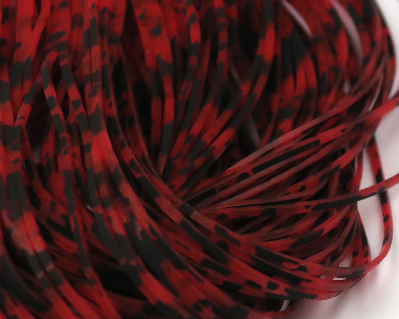 Red and black barred speckled synthetic Crazy Legs strands for fly tying, thin flexible rubber legs