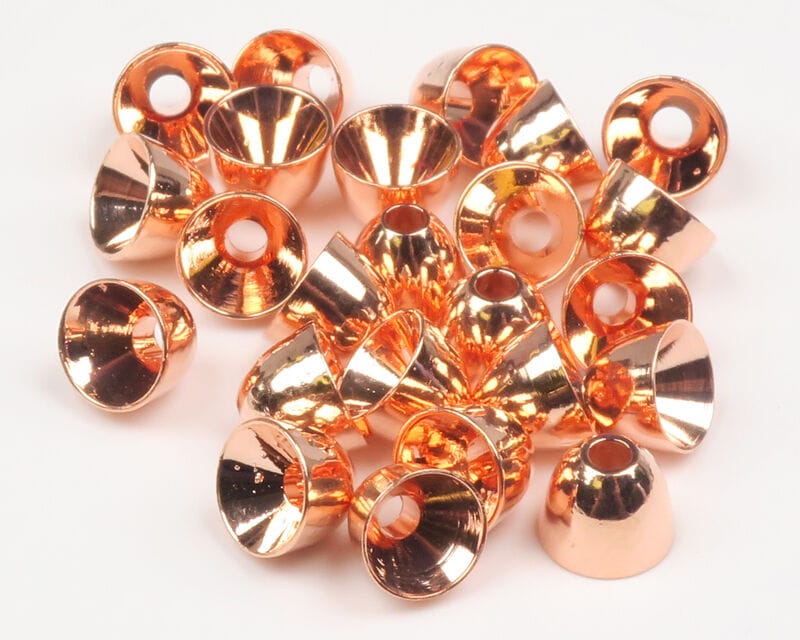 Hareline brass cone heads for fly tying, shiny copper-colored tapered hollow cones with center holes, polished metal finish