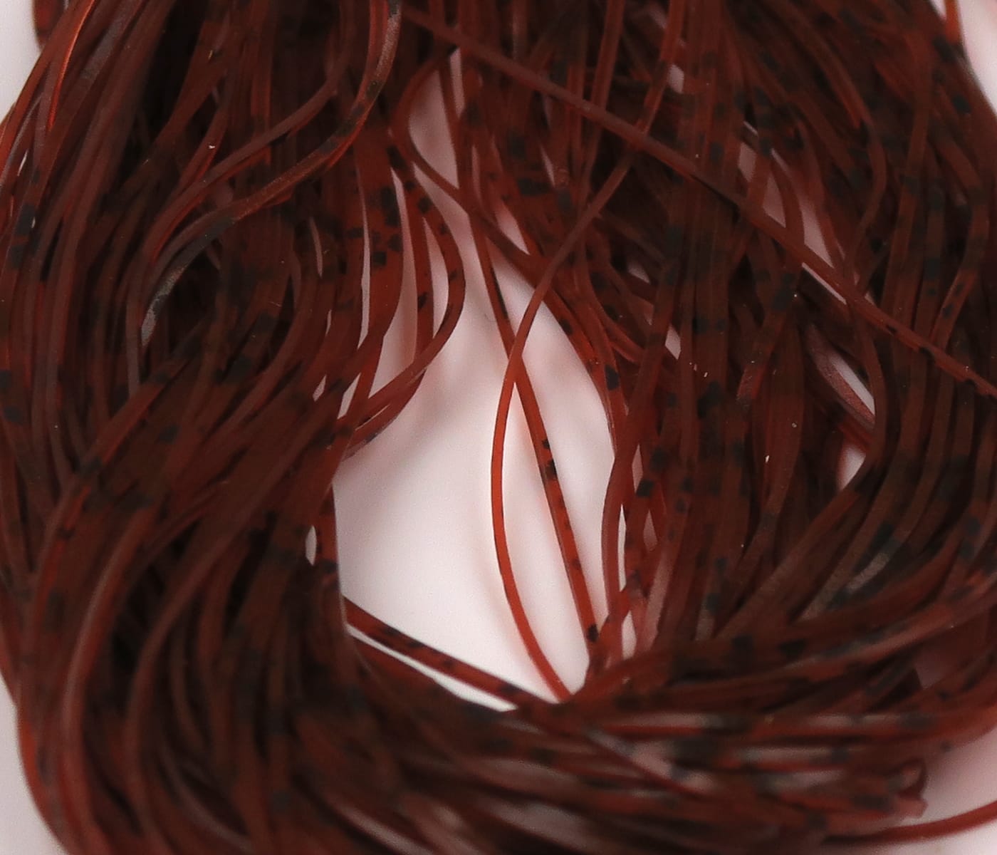 Hareline buggy nymph legs, reddish-brown rubber strands with black speckles, thin synthetic legs for fly tying