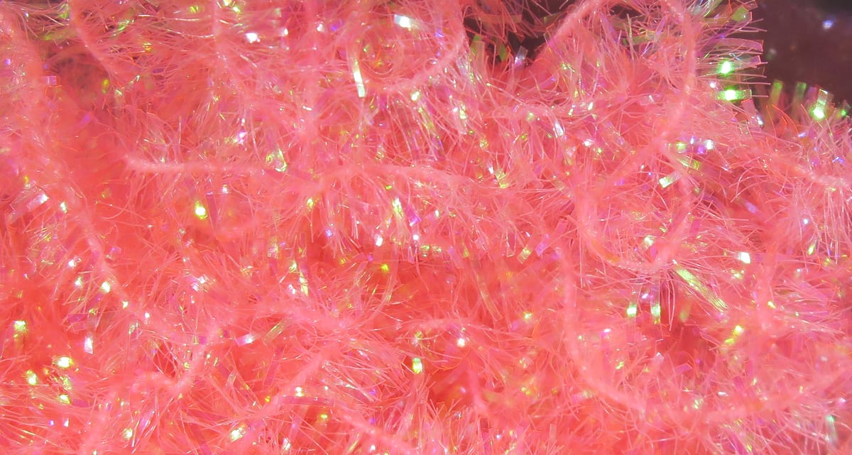 Neon pink cactus chenille with iridescent tinsel strands, fuzzy textured fly tying material