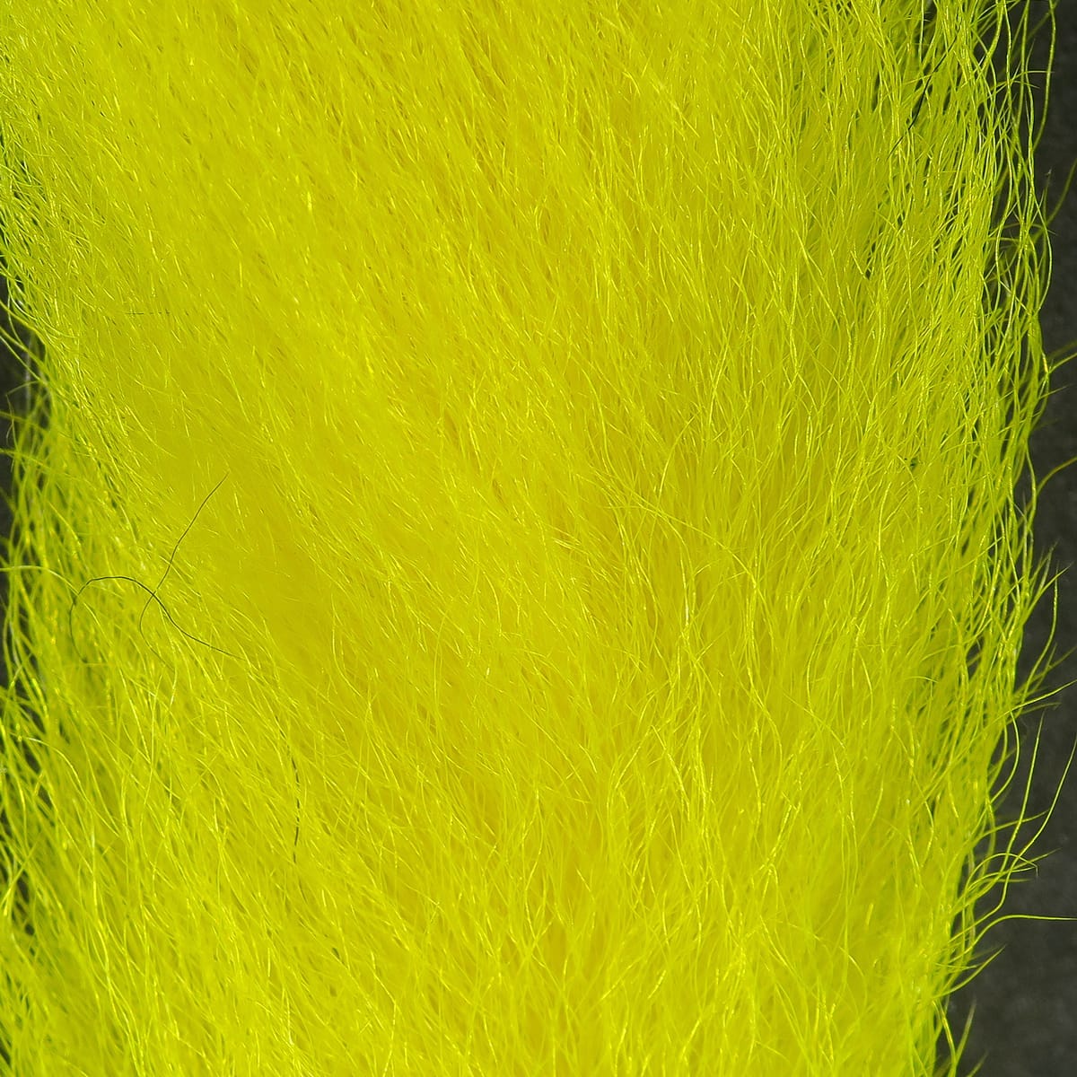 Bright chartreuse calf tails, long fine natural hair fibers for fly tying with soft tapered texture