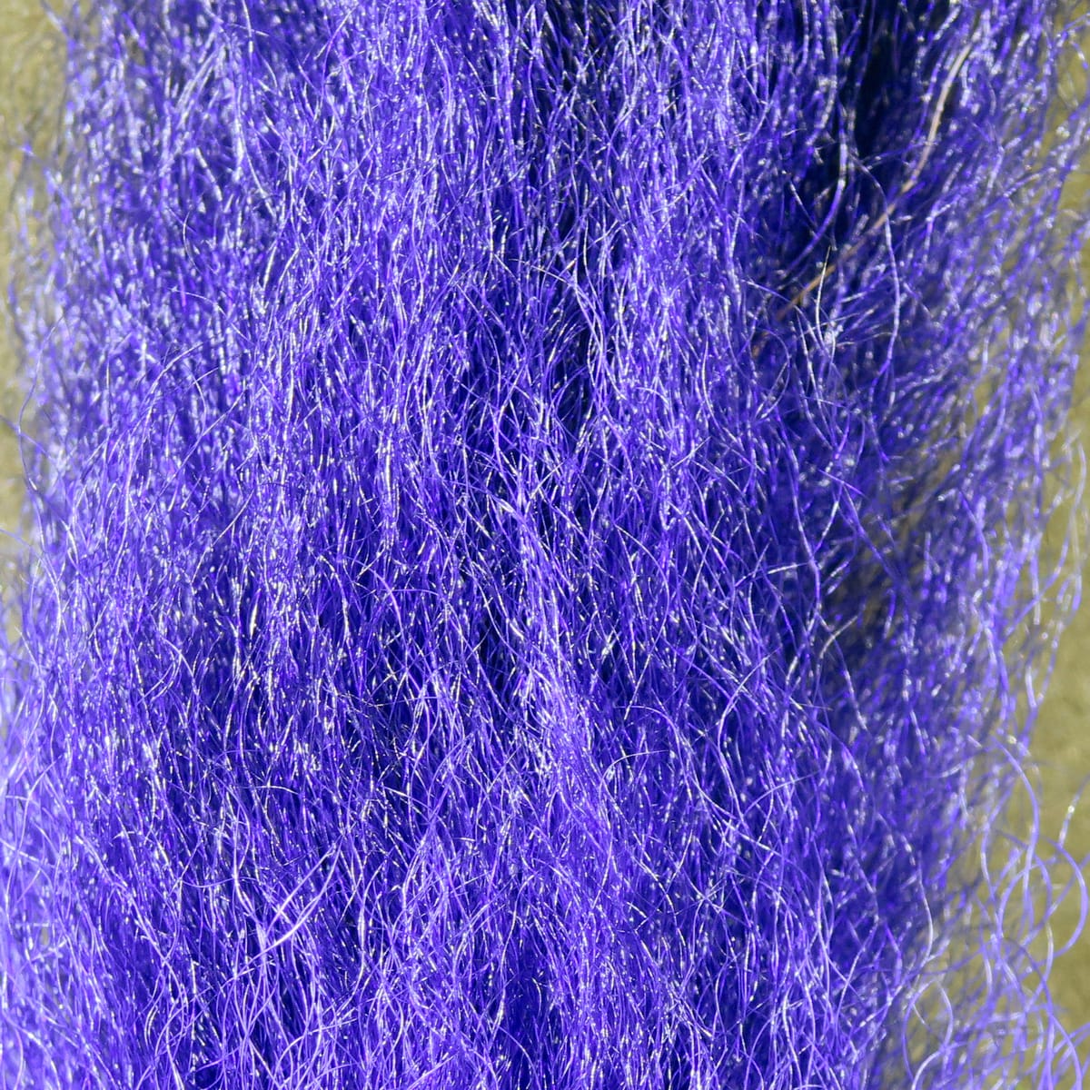 Vibrant purple calf tail hair, fine wispy natural fur fibers with subtle sheen, ideal for fly tying