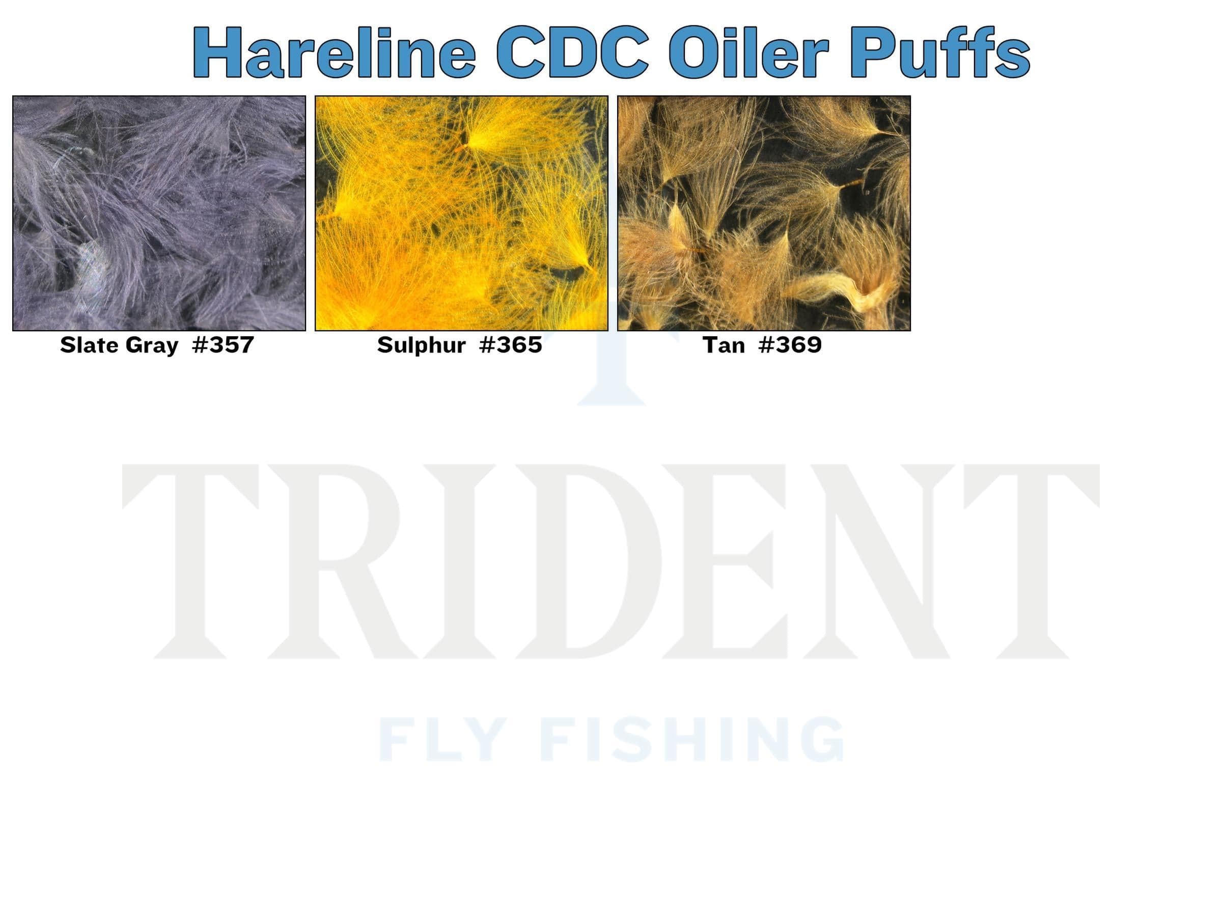 Three CDC oiler puff clusters for fly tying: soft slate gray, bright sulphur yellow, and light tan wispy feathers
