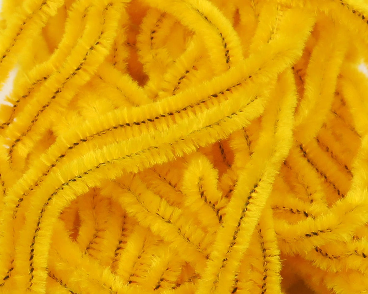 Bright yellow Hareline chenille strands with fuzzy texture and dark stitched core for fly tying
