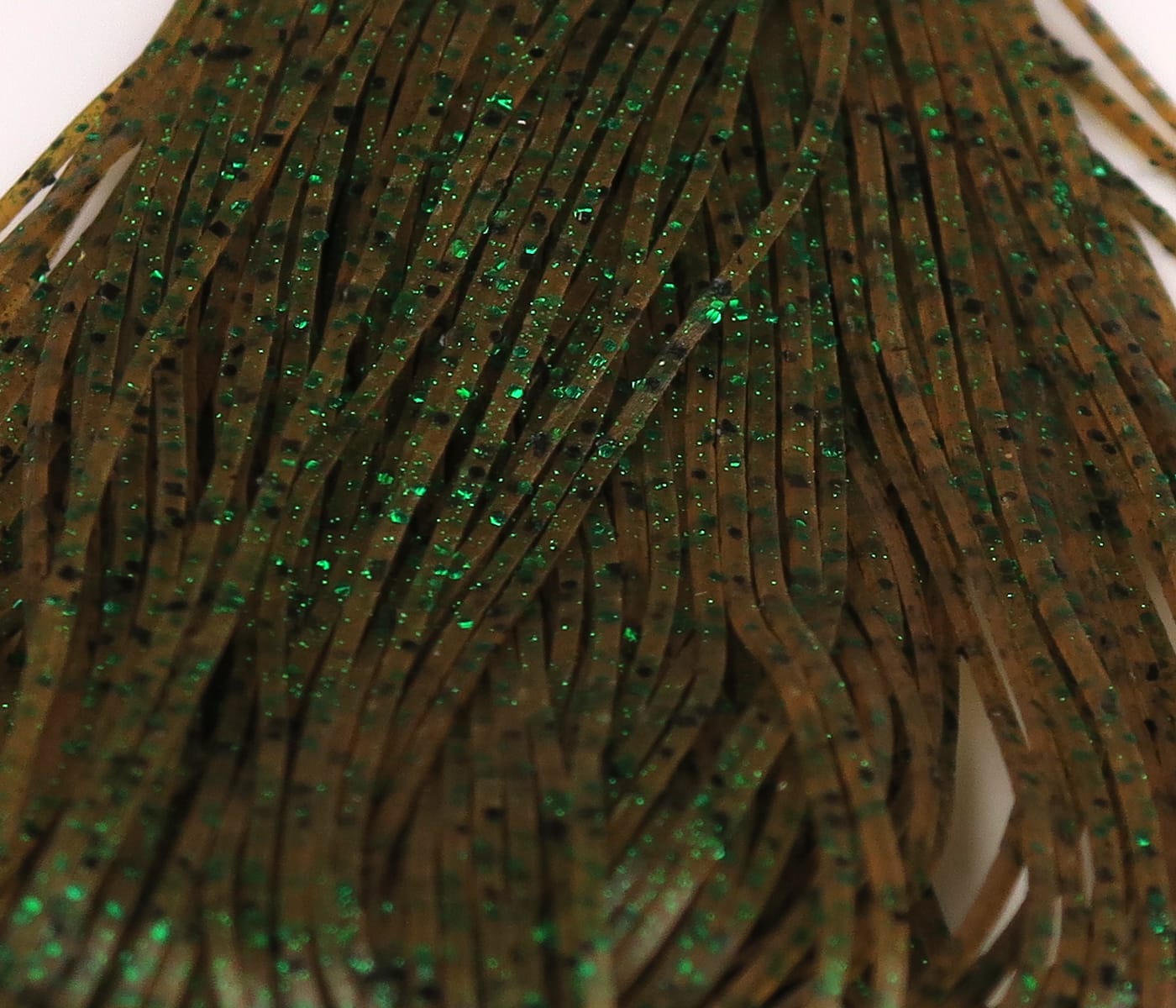 Hareline Crazy Legs brown silicone skirt with thin slotted strands and green glitter flakes for fly tying