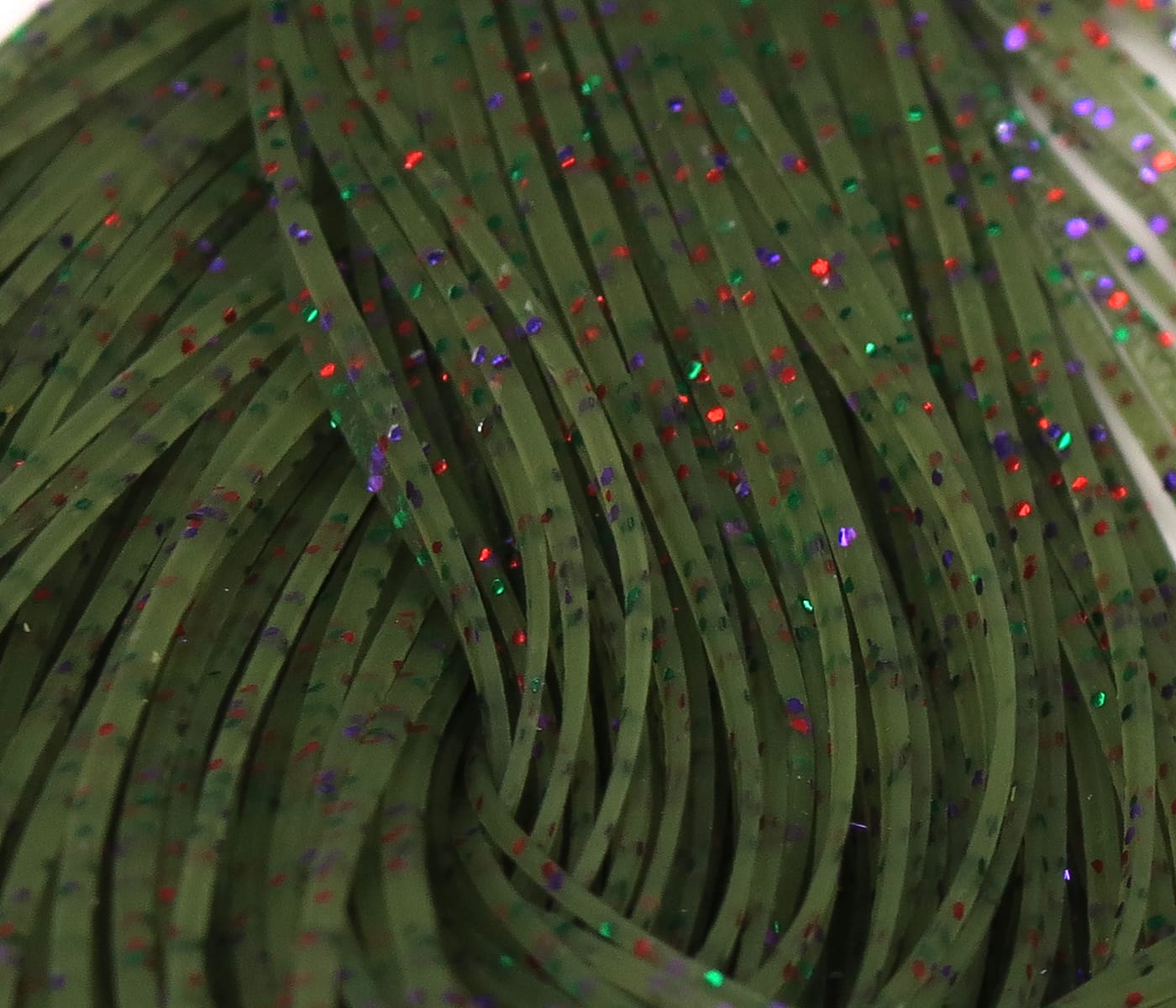 Olive green flat rubber Crazy Legs strands with red, green and purple glitter for fly tying