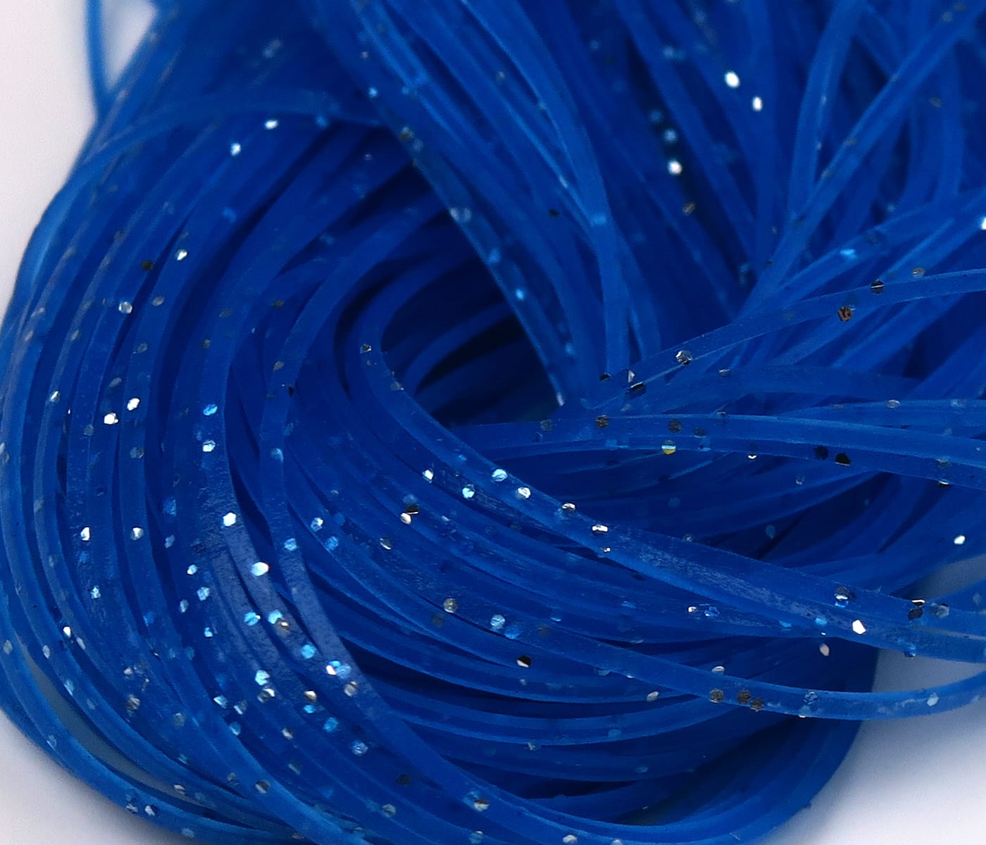 Hareline Crazy Legs bright blue flexible rubber strands with silver holographic flakes, fly tying legs material