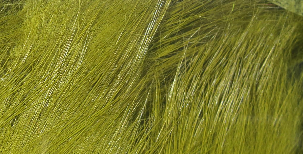 Olive green crosscut rabbit fur strips, glossy fine hairs layered for fly tying