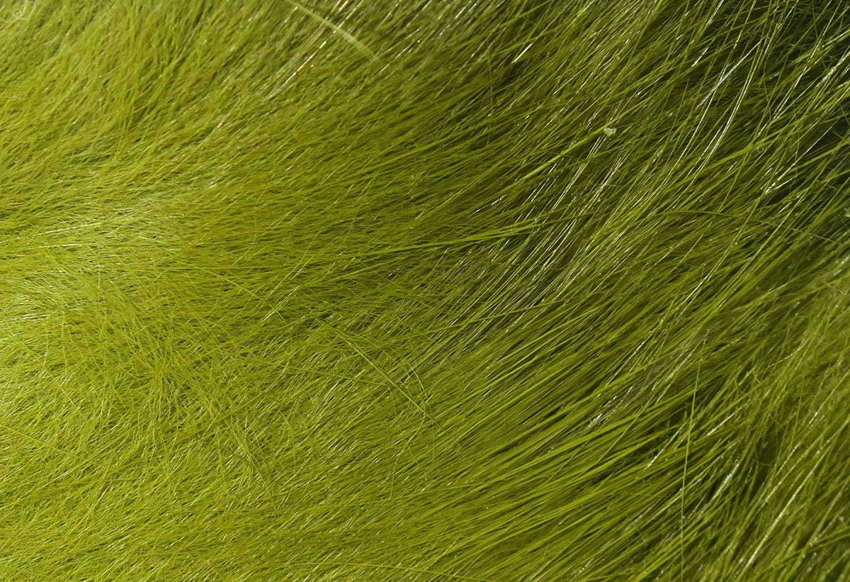 Olive chartreuse crosscut rabbit fur strip with long glossy hairs, soft textured material for fly tying