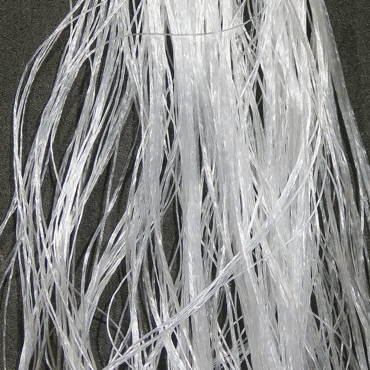 Hareline Daddy Long Legs fly tying material, translucent white synthetic long fine shimmering strands