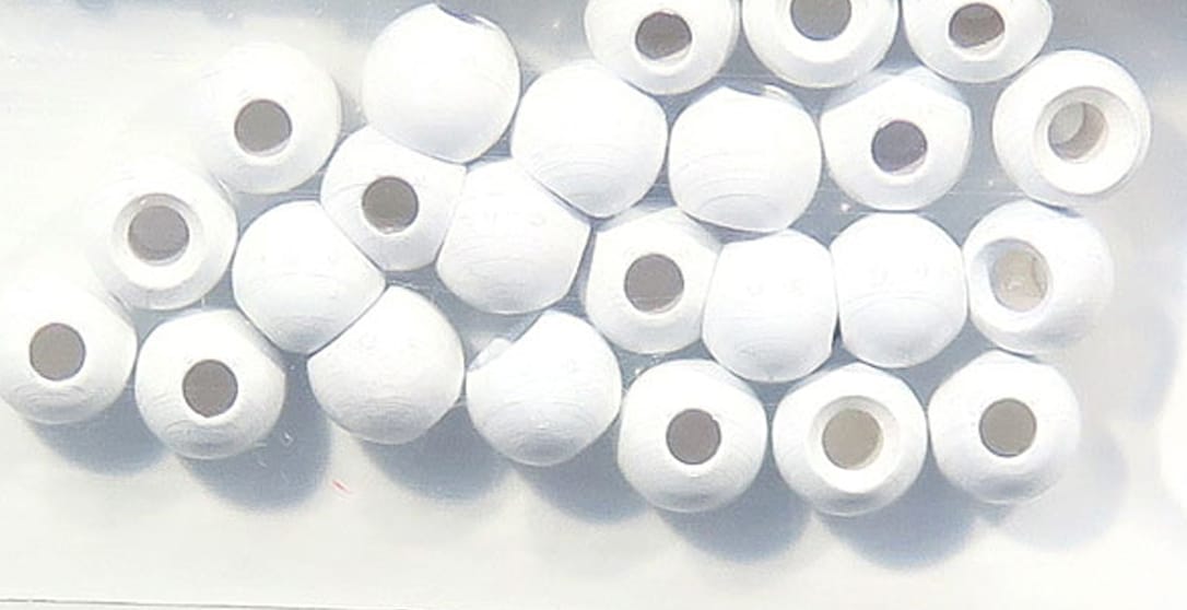 Hareline Dazzle brass beads, white-coated round metal beads with large center holes for fly tying