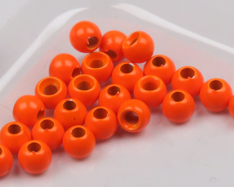 Hareline Dazzle bright orange round beads with visible brass cores, glossy fly tying beads