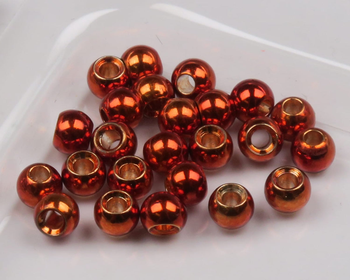 Shiny dazzle brass beads, metallic orange-copper spheres with gold-lined holes for fly tying