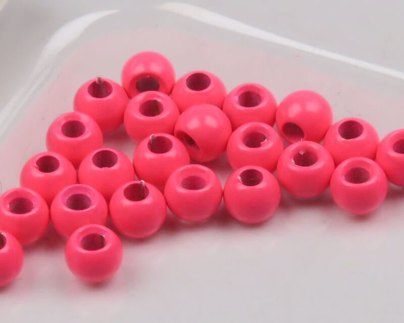 Neon pink Hareline Dazzle brass beads, glossy round fly tying beads with large drilled centers