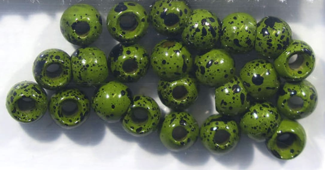 Glossy olive green, black-speckled brass beads with large holes for fly tying