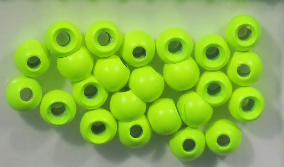 Neon chartreuse glossy brass beads with center holes for fly tying