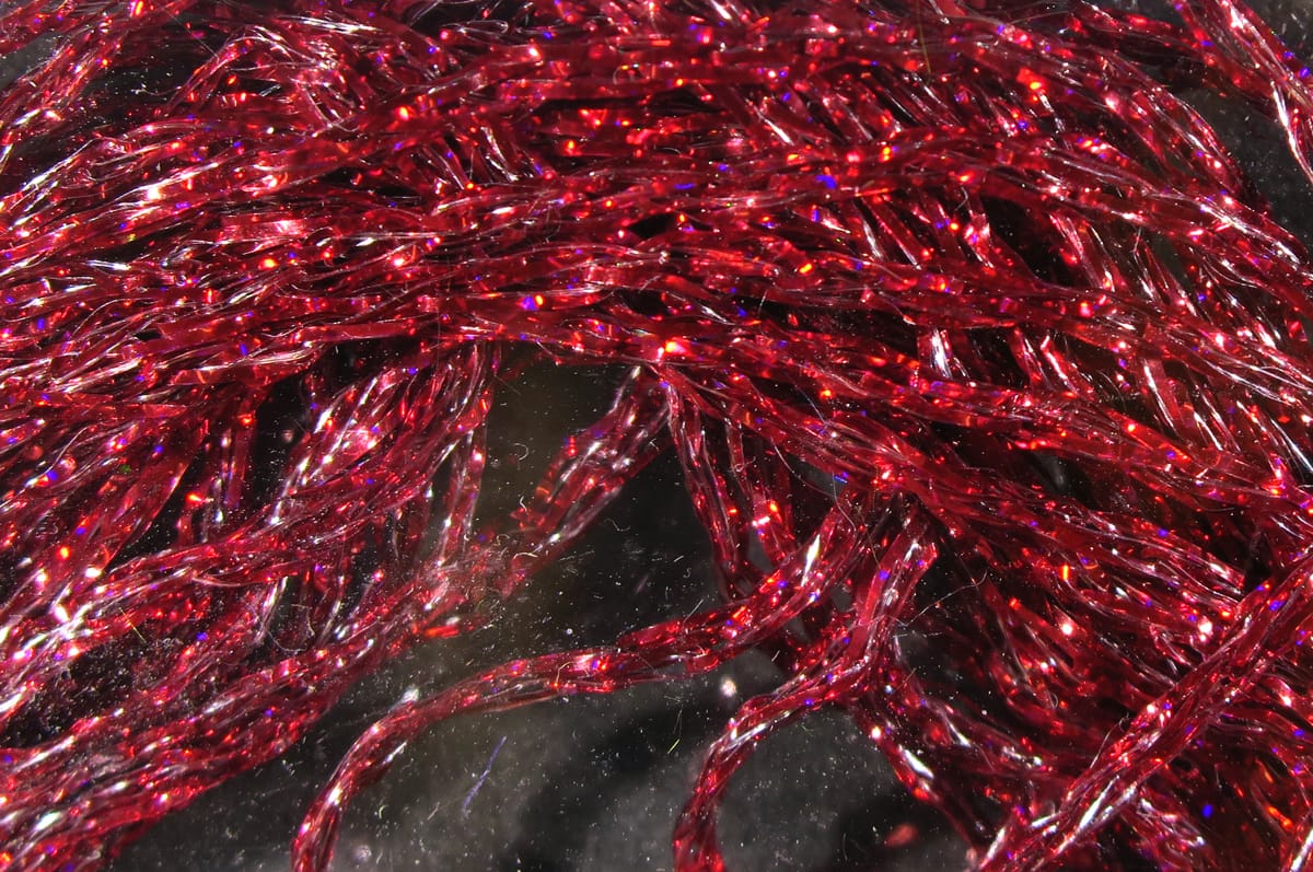 Red holographic Hareline Diamond Braid braided tinsel strands for fly tying, sparkling twisted synthetic flash