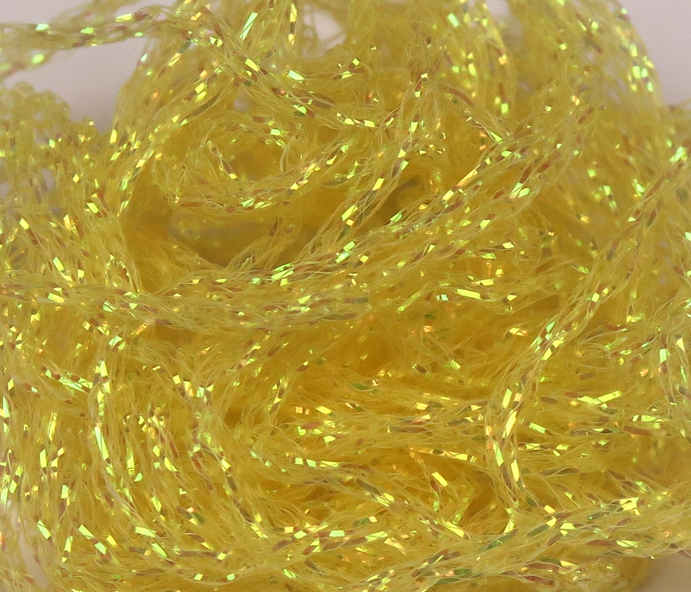 Hareline Diamond Braid shimmering yellow synthetic braid with iridescent flashes for fly tying