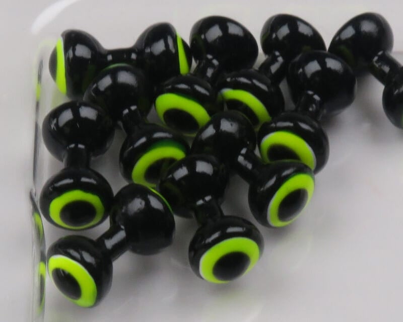 Glossy black double-pupil lead eyes for fly tying with bright chartreuse rings and bulbous two-lobed shape